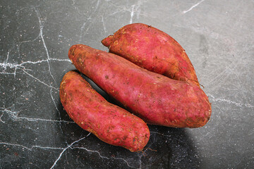 Raw red batat for cooking