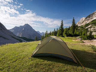 Photo of a tent in the mountain