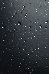 Raindrops on a dark surface