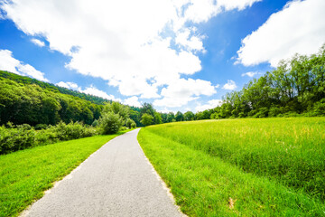 Path at the Haunetalsperre and the surrounding nature. Landscape at the reservoir near Marbach.
