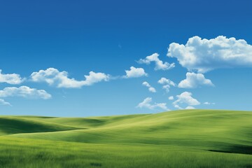 Fototapeta premium A beautiful summer or spring landscape with green grass on the hills and green fields. The blue sky is filled with white clouds and bright sunlight. Nature as a background.
