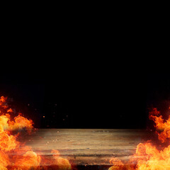 Burning flames with copy space for hot spicy products and food concept.  Wooden fire table and...