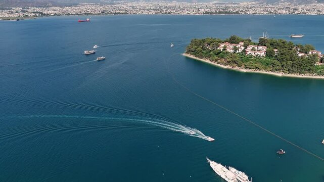 Panning from the bay to the forest on the Fethiye peninsula. 4k drone video

