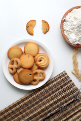 butter cookies. Cheese butter cookies on a white plate. Perfect for recipe, article, catalogue, or any commercial purposes. With copy space. flatlays