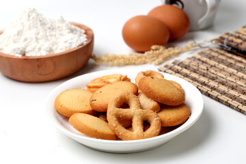 butter cookies. Cheese butter cookies on a white plate. Perfect for recipe, article, catalogue, or any commercial purposes. With copy space.