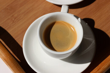 Breakfast Served in Bed. Morning Cup of Espresso Coffee on Wooden Tray.