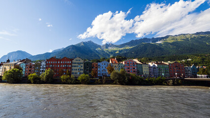 Fototapeta premium Colorful houses of Innsbruck in tyrol, austria at the river Inn