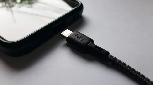 unplug the charging cable from the phone 