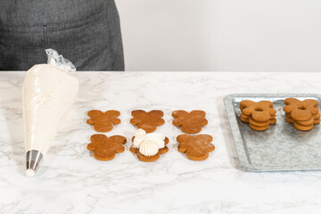 Creating Gingerbread Cookie Sandwiches with Buttercream Filling