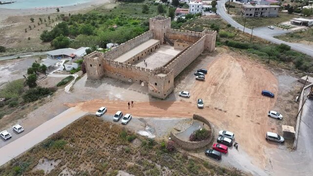 Aerial view of Venetian Castle of Frangokastello, in front of Lefka Ori Mountains (White Mountains), Chania region, Crete, Greek Islands, Greece