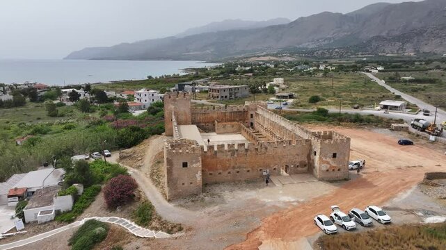 Aerial view of Venetian Castle of Frangokastello, in front of Lefka Ori Mountains (White Mountains), Chania region, Crete, Greek Islands, Greece