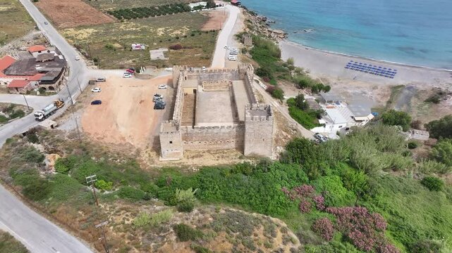 Aerial view of Venetian Castle of Frangokastello, in front of Lefka Ori Mountains (White Mountains), Chania region, Crete, Greek Islands, Greece