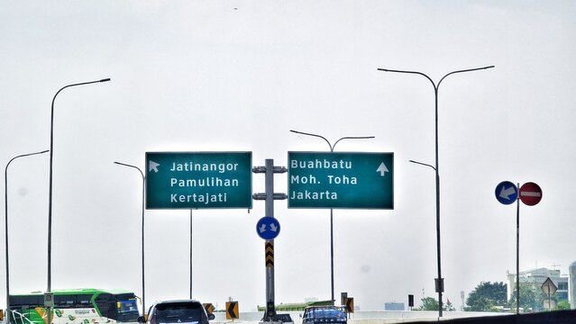 Bandung, Indonesia on December 20, 2023. A butterfly sign at the toll road intersection towards Jatinangor Pamulihan Kertajati and Buah Batu Moh Toha Jakarta.