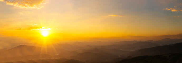 Banner Scenic view dramatic beautiful sunset sky. Panorama Natural Sunset Sunrise on meadow silhouette shadow dark land. Vibrant dramatic sky in Countryside. Landscape Sky At Sunset with copy space