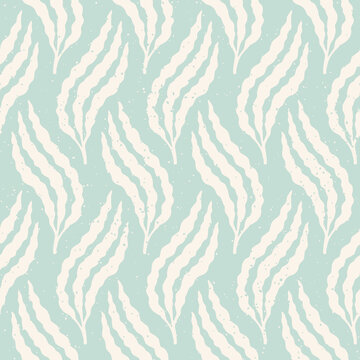 Pastel blue and cream seaweed seamless pattern with speckled texture. Light blue block print summer holiday background.