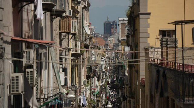 Elevated view of Naples and bustling narrow street, Naples, Campania, Italy