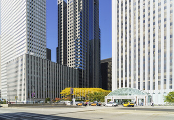 Chicago, Illinois, USA - October 21, 2014: Autumnal view of taxi parked on the road in front of high rise buildings
