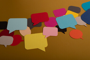 Colorful Speech Bubbles on Brown Background