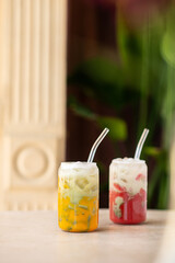 Passion fruit and strawberry iced drink. Summer cold drink. Vegetarian drink. Selective focus.