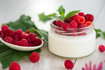 homemade food, milk yogurt with fresh raspberries