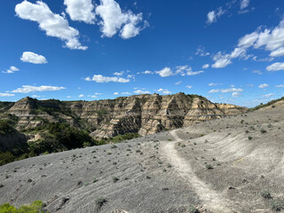 A hiking trail leads into the North Dakota badlands