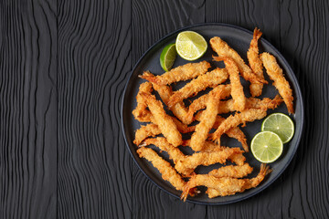 deep fried panko breaded shrimp on a plate