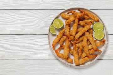 deep fried panko breaded shrimp on a plate