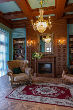 Luxury interior of home library. Sitting room with elegant furniture