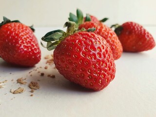 Fresh strawberry and light background. Horizontal photo.