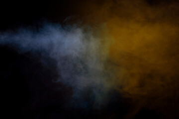 Blue and yellow steam on a black background.
