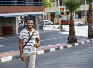 Portrait, walking and black man in city with coffee, trendy outfit and smile for web designer...
