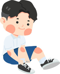 Cute kid boy tying shoe laces