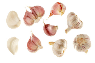 White background with isolated cut out garlic and garlic bulbs. Vegetables food product for montage. 