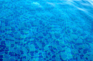 surface of blue swimming pool,background of water in swimming pool.