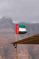 UAE flag in the mountains