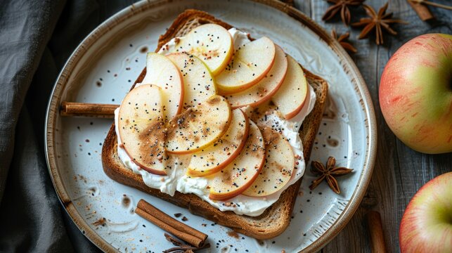 breakfast recipe, a simple and tasty breakfast idea of cinnamon toast with cream cheese and apple slices served on a ceramic plate, set against a copy space background