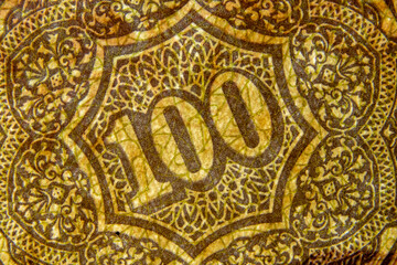 Photograph of banknotes with a magnifying lens Makes it possible to see the delicate lines that the creator has painted on the banknote.