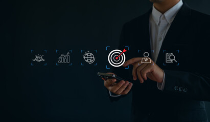 Businessman focusing on target goal icon, corporate development, global business leadership, strategy, prospects, goals, Target,  strategies for success.