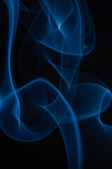 A photo of smoke that has a beautiful billowing appearance. Suitable for making background images.