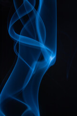 A photo of smoke that has a beautiful billowing appearance. Suitable for making background images.