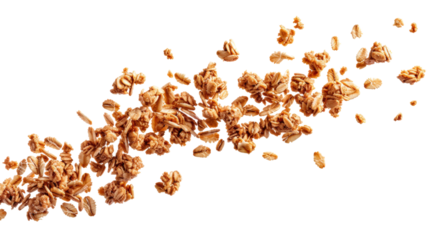 Close-up of granola scattered against a white background. Healthy breakfast food with oats, nuts, and honey forming a textured, crunchy mix.
