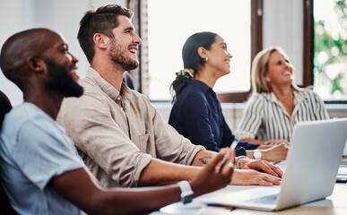 Attention, meeting and business people in conference room with laptop, smile and project development at seminar. Office, workshop and team at creative presentation with ideas, objectives or planning