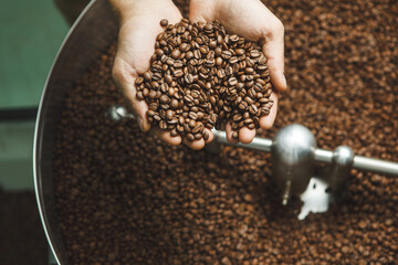 Roasted Coffee Beans Held Above Roasting Machine, Top View