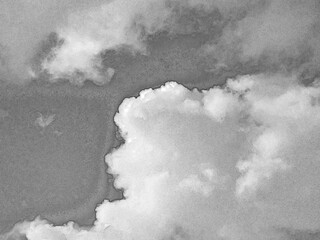 White fluffy clouds in the deep blue sky. Heaven background. Hand drawn pencil sketch illustration