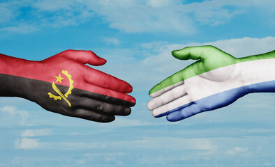 Sierra Leone or Salone and Angola country handshaking with flags, consensus concept international co-operation illustration