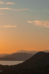 Sunset in the mountains with olive groves over the Mediterranean sea
