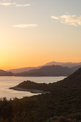Sunset in the mountains with olive groves over the Mediterranean sea