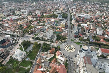 Obraz premium Skadar historical city with surrounding mountains and Skadar lake,Shkoder,Albania,Balkan,Europe,aerial panorama landscape view, cityscape