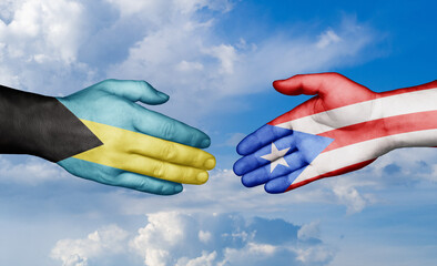 Puerto Rico and Bahamas country handshaking with flags, consensus concept international co-operation illustration