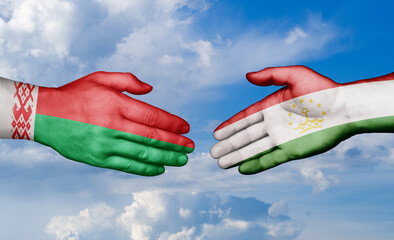 Tajikistan and Belarus country handshaking with flags, consensus concept international co-operation illustration